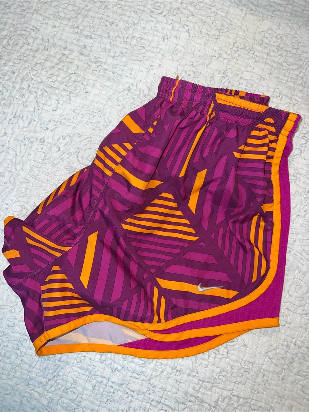 Nike Women’s Magenta & Orange Geometric Athletic Shorts